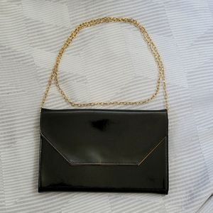 Black leather clutch/shoulder bag